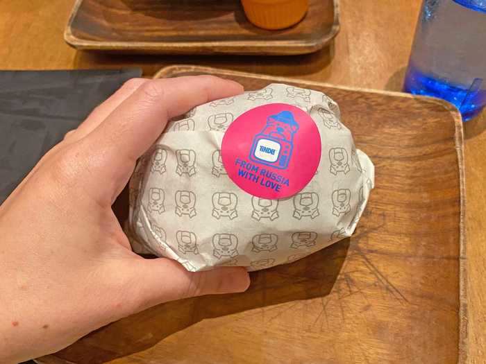 I ordered the From Russia With Love burger, which cost 20 Singapore dollars, or about $15. It arrived wrapped in paper with a colorful sticker.