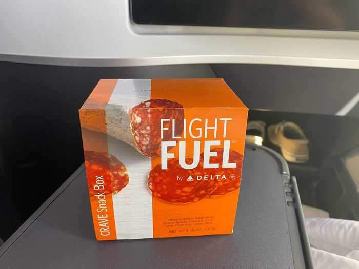 After takeoff, flight attendants distributed the same snack bags but also offered a selection of snack boxes. These could be brought before the pandemic for between $7 and $10., hardly living up to first class expectations.