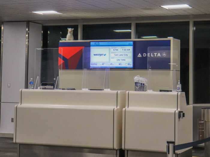 The gate agent reminded passengers before boarding that masks are required in every step of the air travel journey as part of the new federal mandate. More than 800 flyers have been banned from Detla for non-compliance as of mid-January.