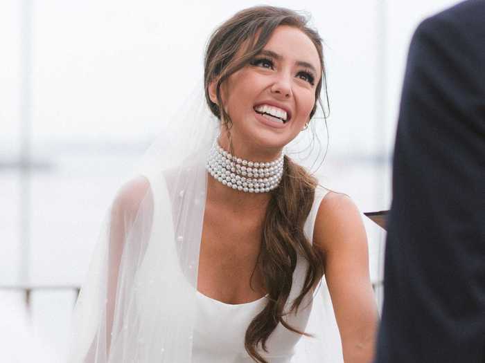 She also accessorized with a statement pearl necklace that complemented the veil.