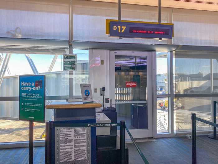 The gate area similarly had plexiglass partitions, but there were few reminders to social distance or anything on Frontier