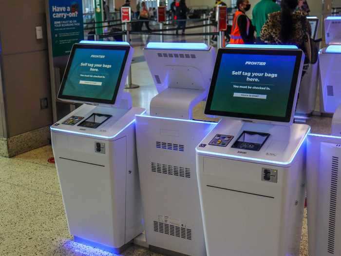 The self-serve kiosks, standard for each airline in the terminal, were moderately spaced but didn