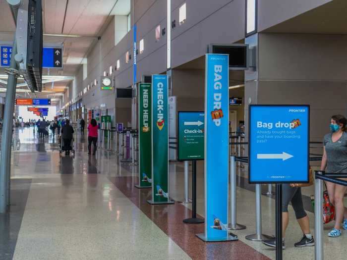 Frontier had separate lines for those needing to check-in with an agent and those just dropping off their bags. Check-in was empty enough that staying six feet apart wasn