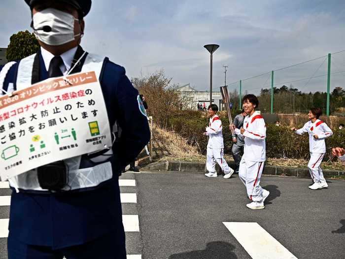 The torch was then carried through the streets of Fukushima.