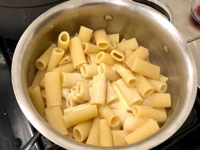 Once the pasta was ready, we tossed in the eggs and cream.