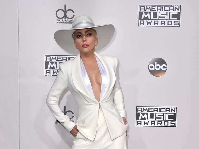 She wore a similar white look at the American Music Awards later that year.