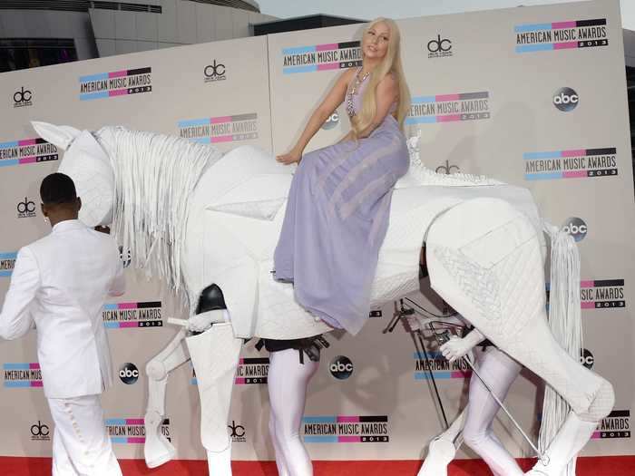 She made another bold red carpet entrance at the 2013 American Music Awards.