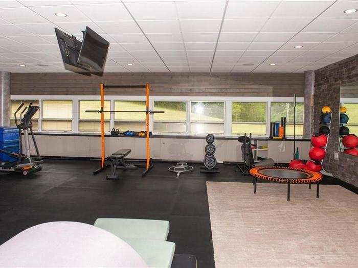 Outside the gymnasium, there is a private fitness room.