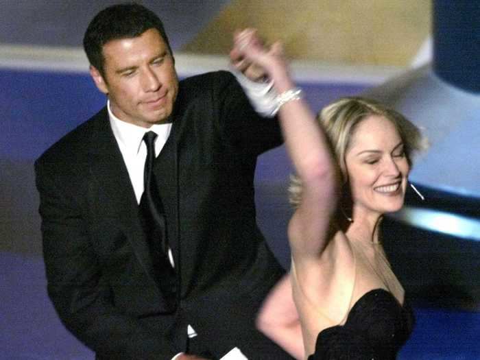 She says brain surgery left her unable to walk two weeks before her famous Oscar dance with John Travolta