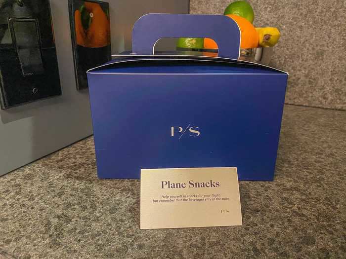 Guests are also encouraged to take snacks with them on the plane and given this blue box to do so.