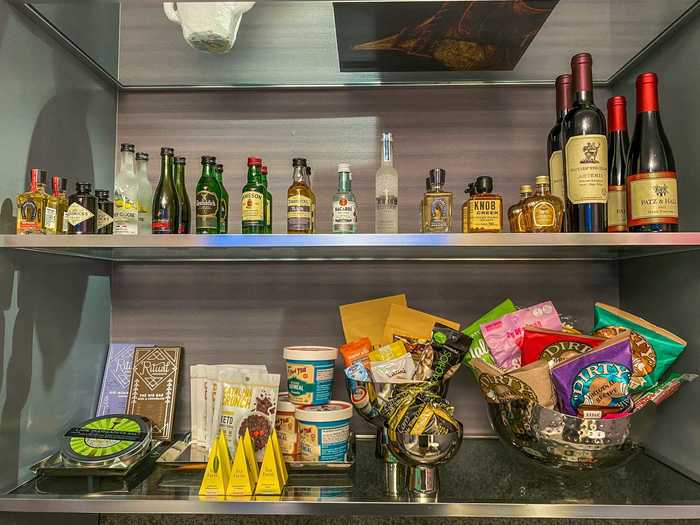 A selection of high-end snacks, liquors, and wines were all on offer and available free of charge to guests.