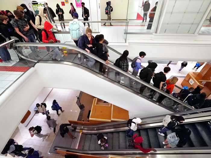 The escalators are one of the features that make Downtown Burlington High School different from others. Students told the AP that escalators and elevators are "nice features" for students.