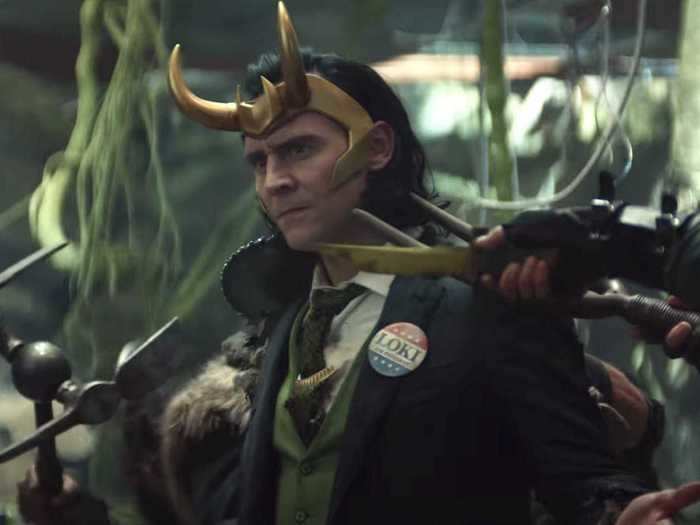 Loki is seen wearing a "vote" pin, which might be a nod to the comics.