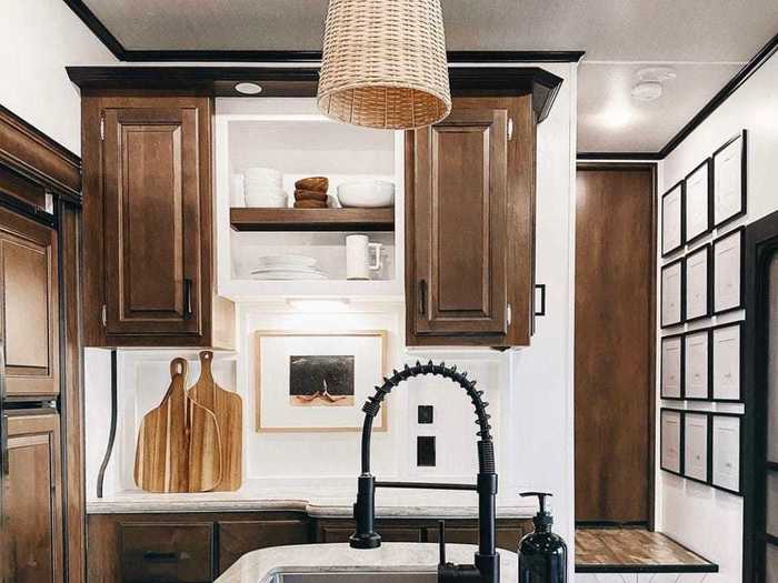 The entryway leads straight to the kitchen, where Libby said she swapped out all the hardware and fixtures that looked like they belonged in an RV.