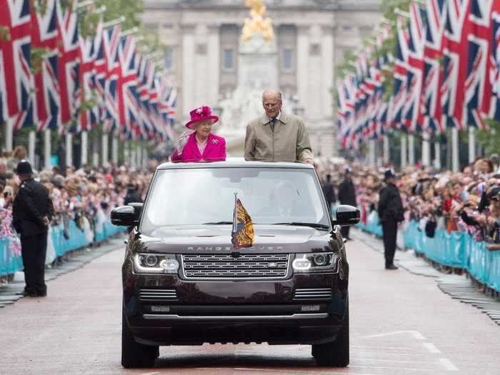 ...and has made countless public appearances. In this image, the people of London wave to the couple in celebration of the Queen