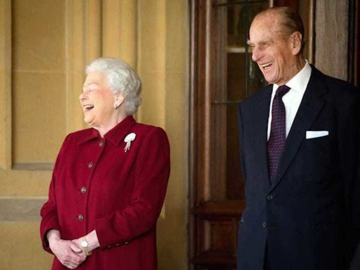 2014: The couple laughed after bidding farewell to the President of Ireland Michael D. Higgins and his wife Sabina at Windsor Castle.