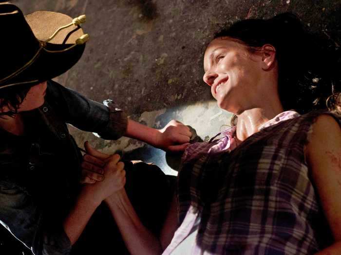 12. Lori Grimes died during a hasty C-section birth to Judith.
