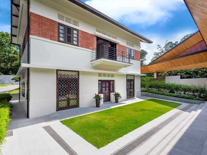 The home has three courtyards, one of which features a grassy lawn and sits between the historic bungalow and the modern bungalow.