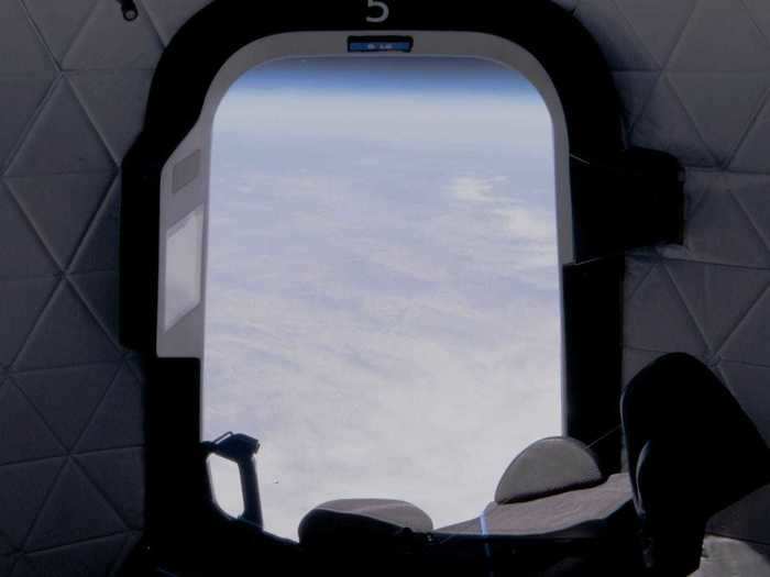 Big windows in the capsule give passengers a clear view of the Earth