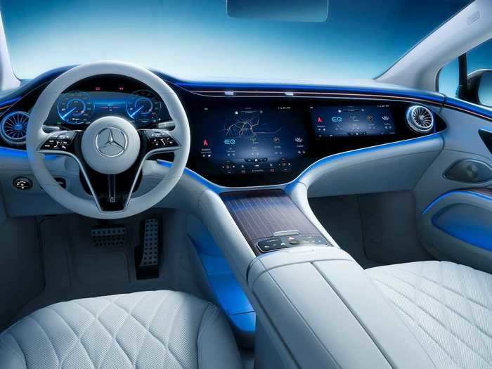 The "MBUX Hyperscreen" is actually a single piece of glass with three OLED displays underneath: a 12.3-inch instrument cluster, a 17.7-inch center screen, and a 12.3-inch display for the passenger.