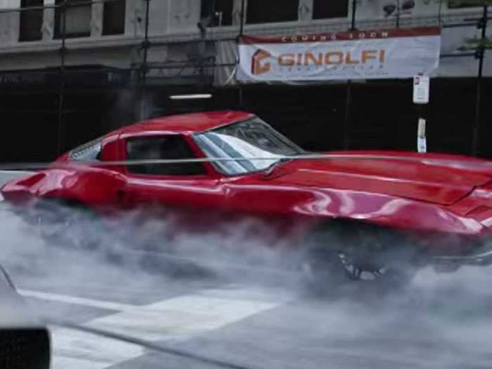 Letty drives a bright red 1966 Corvette Sting Ray Coupe through the streets of NYC in "The Fate of the Furious."