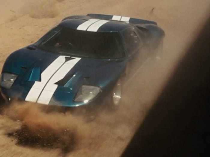 Mia drives off from the train heist in "Fast Five" in a gorgeous blue and white 1965 Ford GT40.