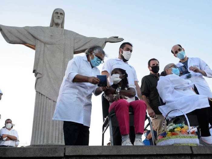 The first person to receive the vaccine in Brazil got the shot at the base of the statue of Christ the Redeemer.