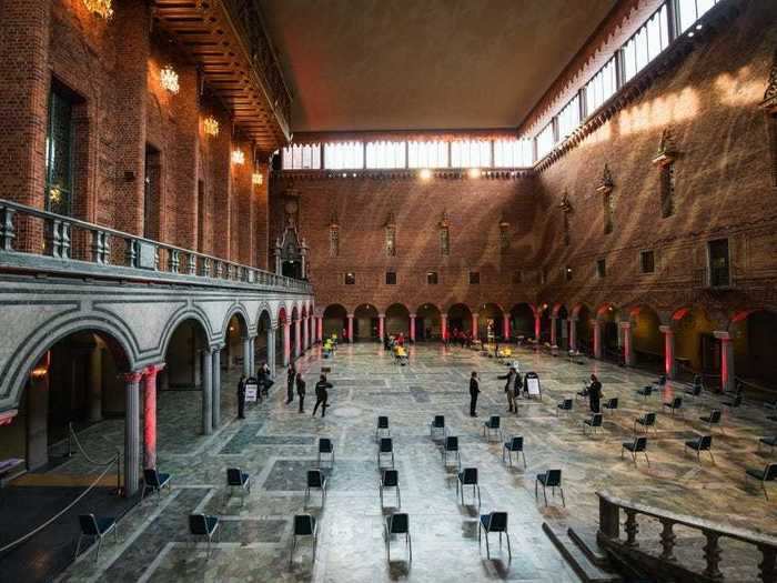 Stockholm City Hall in Sweden usually hosts Nobel Prize banquets, but now it hosts vaccinations.