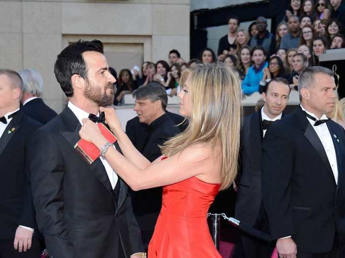 February 24, 2013: At the 85th Oscars, Aniston helped fixed Theroux