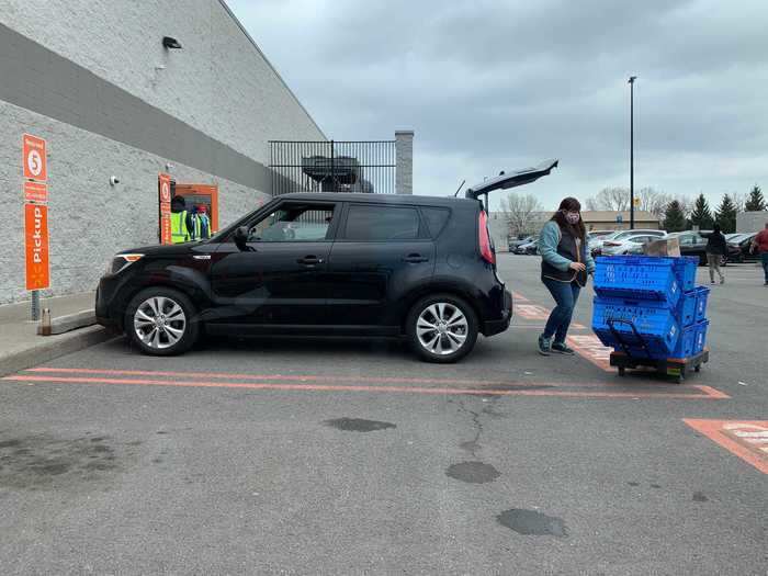 Then, groceries get loaded into the trunk.