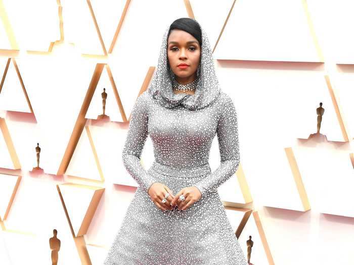 2020: Janelle Monáe returned to the Oscars wearing a stunning bedazzled, hooded look that turned heads on the red carpet.