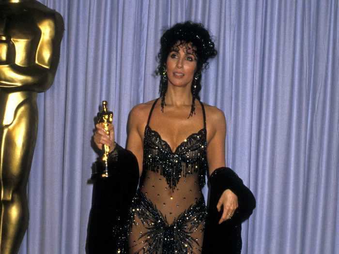 1988: Cher had another memorable look when she took home the Academy Award for best actress.