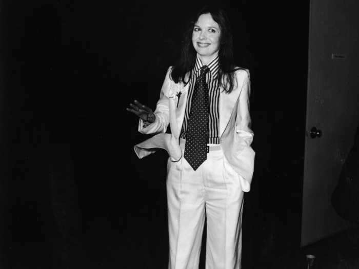 1976: Diane Keaton matched a bright white suit with a striped shirt, a polka dot tie, and a giant carnation in her lapel.