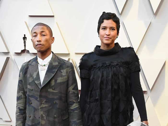 Pharrell Williams traded in a traditional suit for a camouflage ensemble complete with shorts.