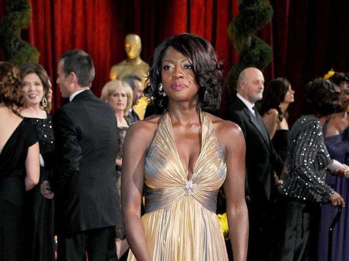 Viola Davis looked glowing in gold with this Reem Acra gown in 2009.