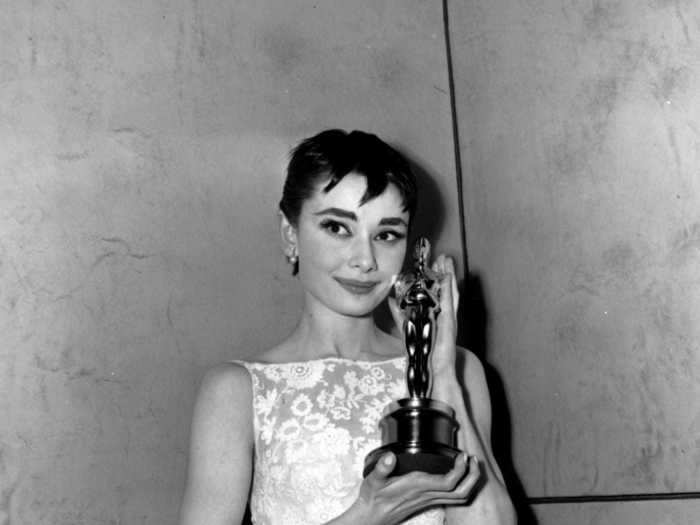 Audrey Hepburn looked incredible in her ivory Givenchy dress at the 1954 ceremony.