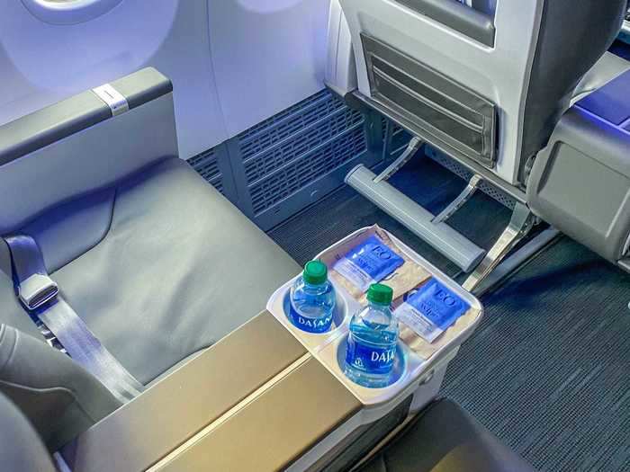 Flight attendants also left bottles of water and sanitary wipes at the seats for passengers. Neither was given to those in economy.