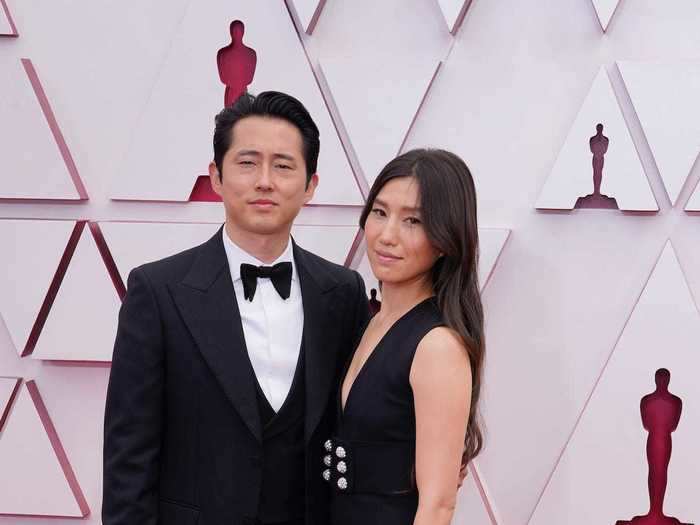 Steven Yeun wore a classic tuxedo, while Joana Pak