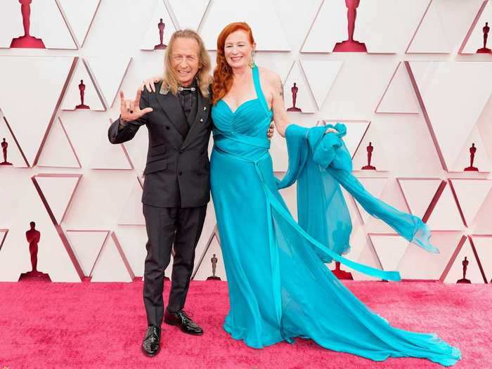 Paul Raci rocked an all-black look, while his wife Liz Hanley Raci wore a teal dress.