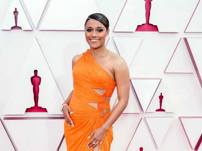 Ariana DeBose opted for a one-shouldered orange gown for the Oscars red carpet.