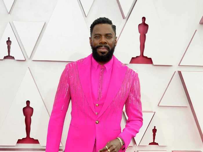 Colman Domingo arrived at the Oscars in a bright pink suit.