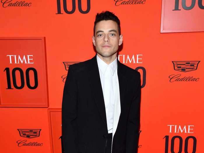 "Bohemian Rhapsody" star Rami Malek looked dashing in a long overcoat, a spin on the typical black tux.