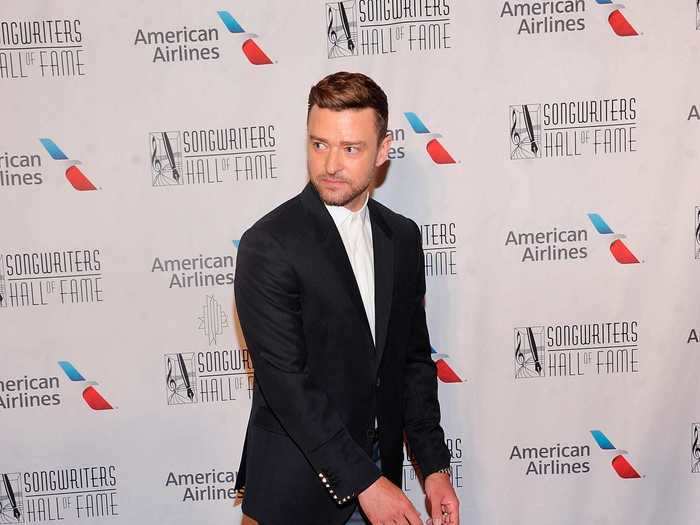 Justin Timberlake wore a mismatched jacket and pants - complete with a sleek pinstripe down the side - for a bold look in 2019.