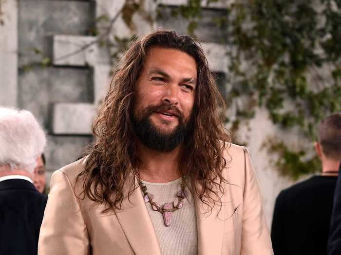 Jason Momoa also put a metallic spin on a classic red-carpet tuxedo in a rose-gold ensemble.