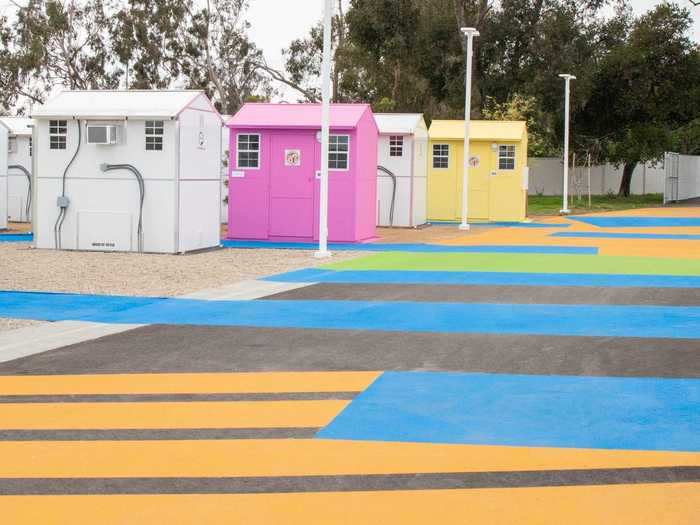 These vibrant colors contrast several of the all-white tiny homes.