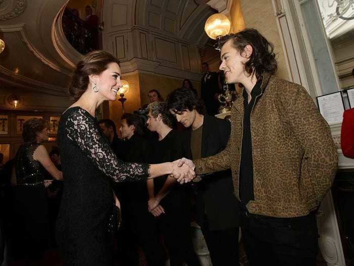 Harry Styles looked like a rock star while shaking hands with Kate Middleton that year.