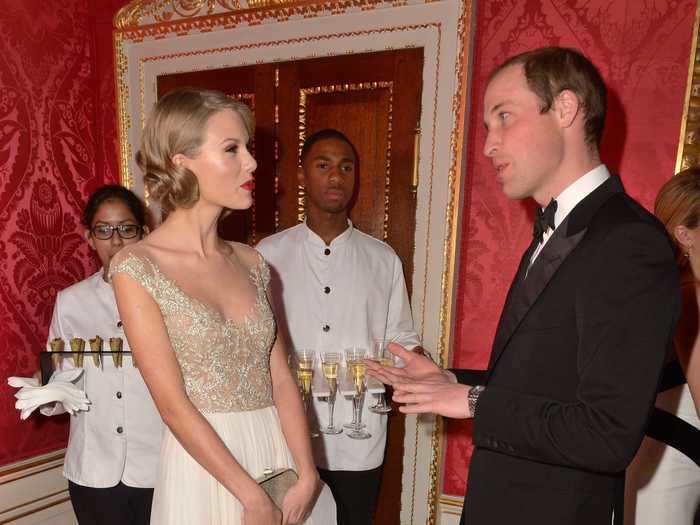 Taylor Swift looked like a princess while chatting with Prince William that same year.