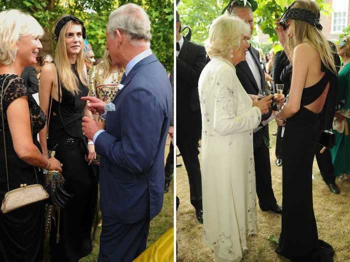 In 2013, Cara Delevingne was wearing head-to-toe black when she was photographed speaking with Prince Charles and Camilla-Parker Bowles.