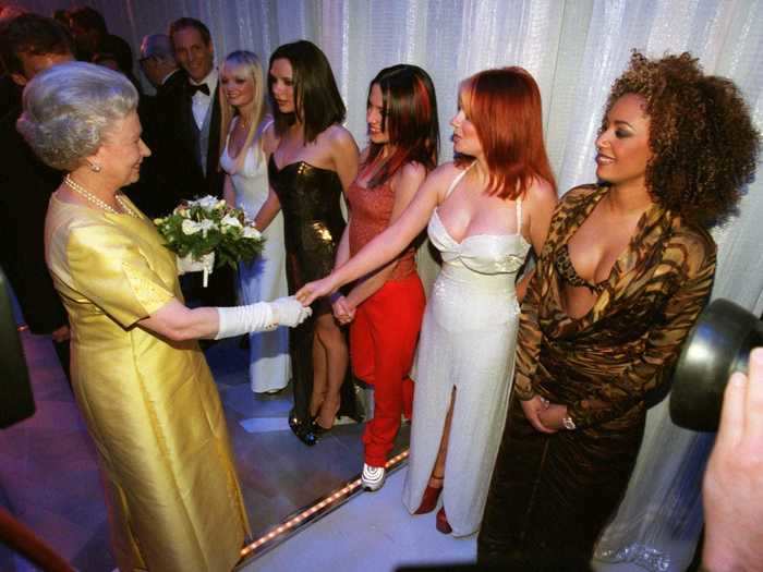 Later that year, Queen Elizabeth II shook hands with the entire Spice Girls group.