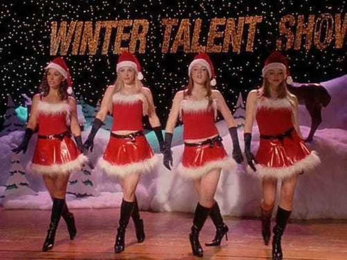 The girls wear plastic skirts for the talent show.